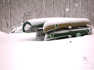 Canoes on rack in snow